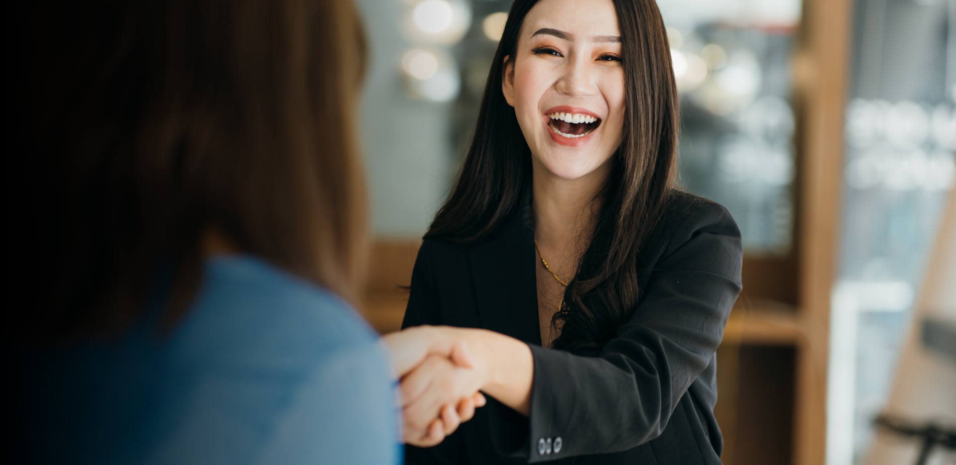 Women shaking hands